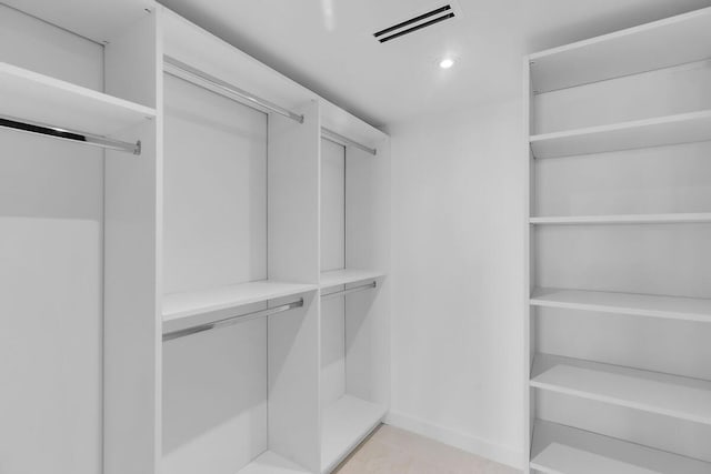 spacious closet with visible vents