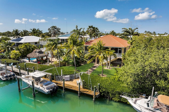 view of dock with a water view and boat lift