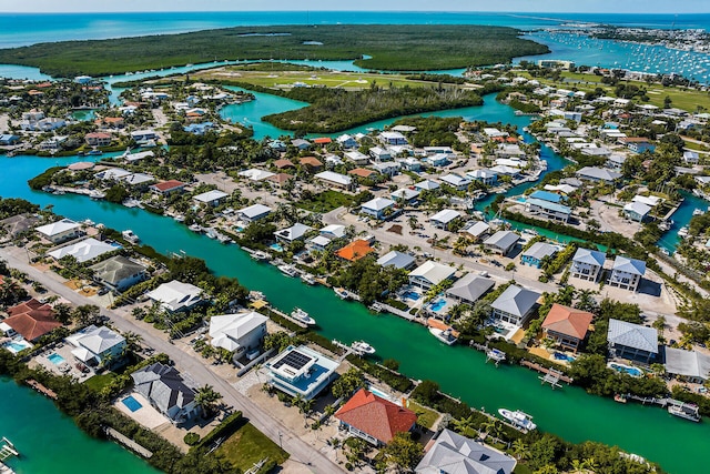 bird's eye view with a water view and a residential view