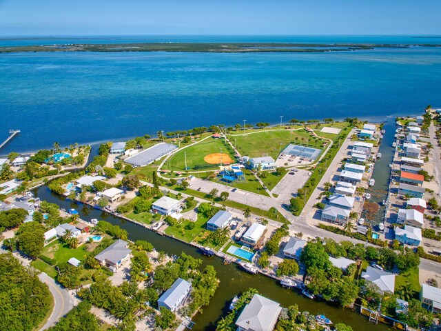 bird's eye view with a water view and a residential view