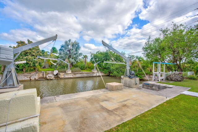 view of patio with a water view