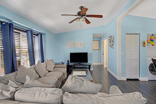 living room featuring vaulted ceiling, ceiling fan, dark wood finished floors, and baseboards