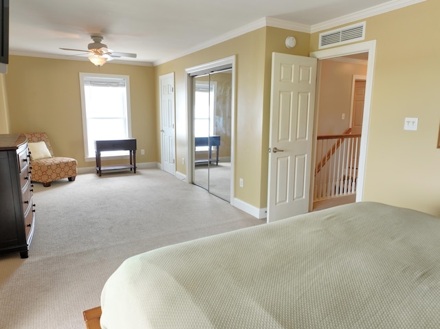 1590 Dolphin Dr, Marathon, FL 33050 - bedroom featuring ornamental molding, light carpet, and ceiling fan