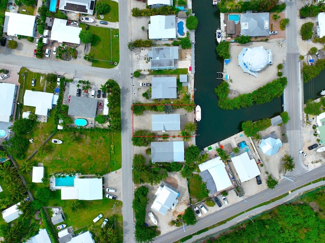 1590 Dolphin Dr, Marathon, FL 33050 - aerial overview of property's location with property parcel outlined and nearby suburban area