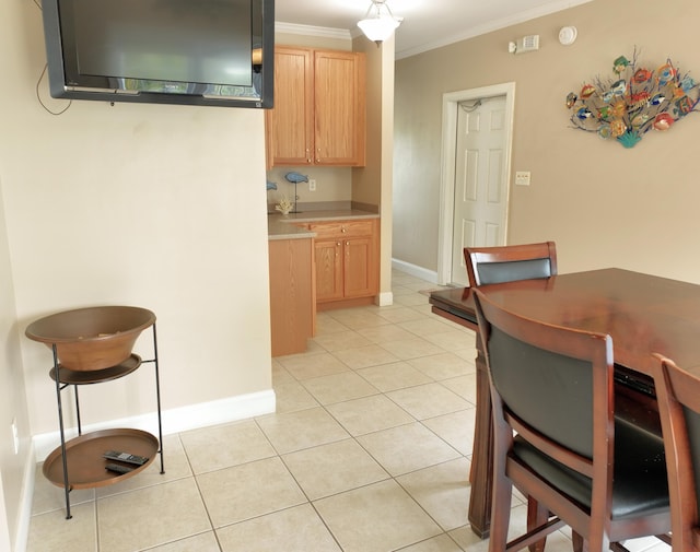 1590 Dolphin Dr, Marathon, FL 33050 - kitchen featuring crown molding, light brown cabinets, and light tile patterned floors