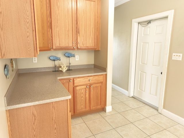 1590 Dolphin Dr, Marathon, FL 33050 - kitchen with light tile patterned floors and light countertops