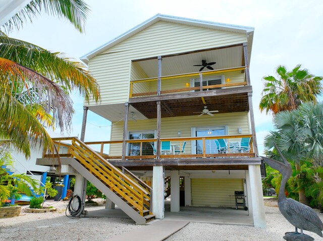 1590 Dolphin Dr, Marathon, FL 33050 - view of front of property featuring a carport, ceiling fan, and a balcony