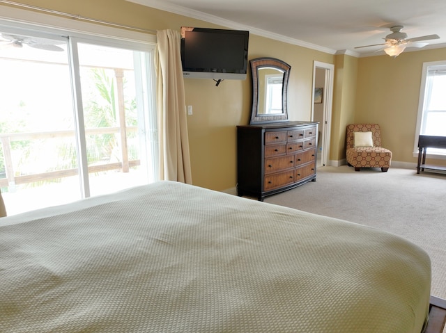 1590 Dolphin Dr, Marathon, FL 33050 - carpeted bedroom with ornamental molding, a ceiling fan, and access to exterior
