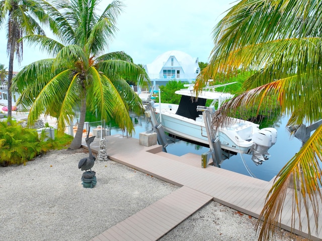 1590 Dolphin Dr, Marathon, FL 33050 - dock area featuring boat lift and a water view
