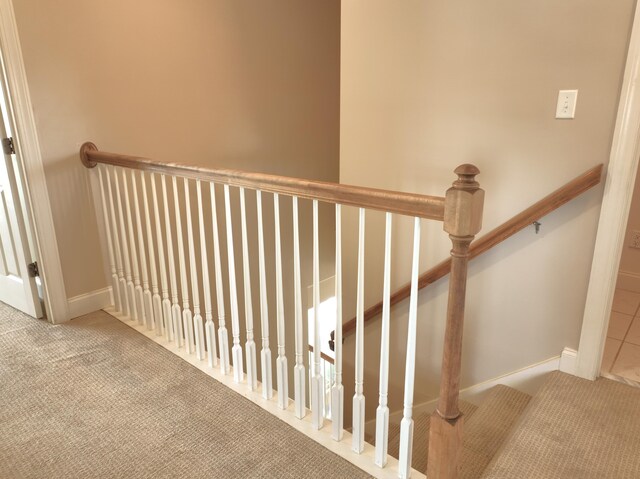 1590 Dolphin Dr, Marathon, FL 33050 - staircase featuring carpet floors and baseboards
