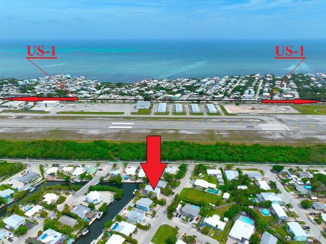 1590 Dolphin Dr, Marathon, FL 33050 - view of property location featuring a large body of water and nearby suburban area