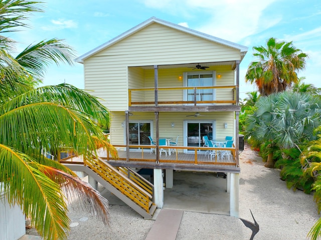 1590 Dolphin Dr, Marathon, FL 33050 - back of house featuring a balcony and a ceiling fan