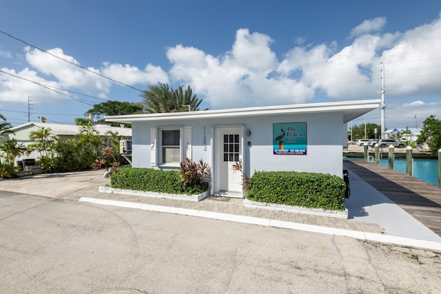 11282 2nd Ave, Ocean, Marathon, FL 33050 - view of front of house featuring stucco siding