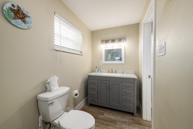 11282 2nd Ave, Ocean, Marathon, FL 33050 - half bath featuring toilet, wood finished floors, baseboards, and vanity
