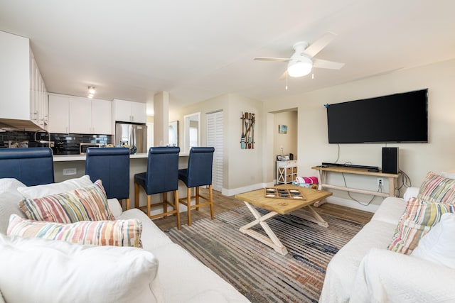 11282 2nd Ave, Ocean, Marathon, FL 33050 - living room with baseboards, ceiling fan, and light wood-type flooring