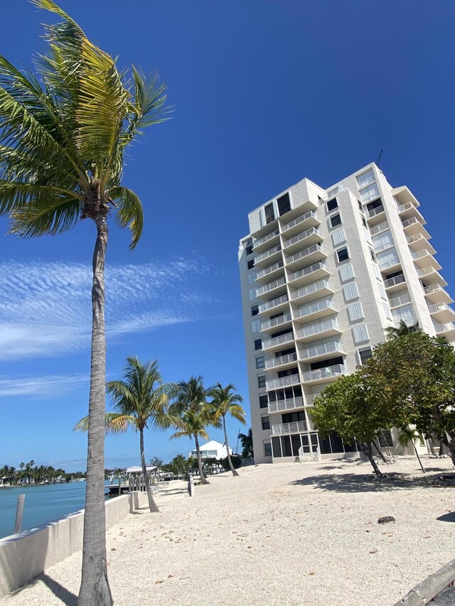 2000 Coco Plum Dr Unit 603, Marathon, FL 33050 - view of apartment building / complex featuring a water view