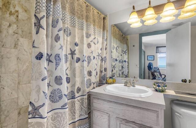 2000 Coco Plum Dr Unit 603, Marathon, FL 33050 - full bathroom featuring vanity and a shower with curtain