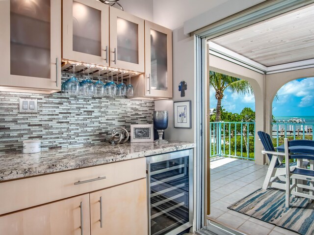 359 Stirrup Key Blvd, Marathon, FL 33050 - indoor dry bar with wine cooler, backsplash, and tile patterned flooring