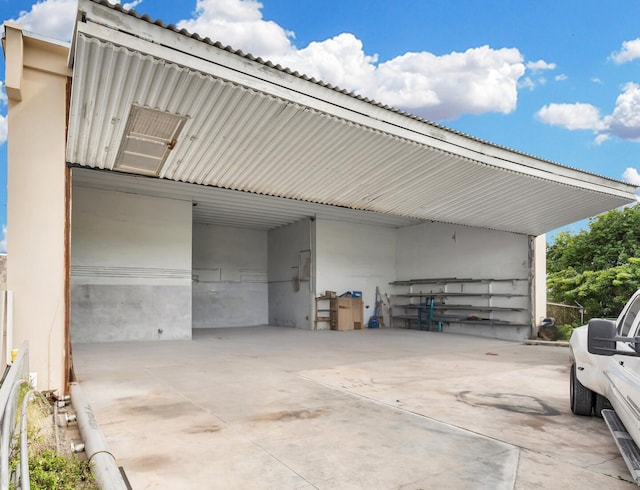 garage with a carport