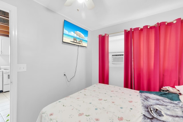 bedroom featuring cooling unit and a ceiling fan