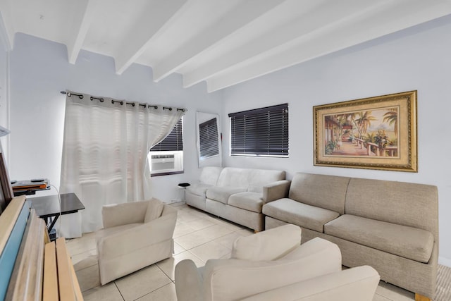 living area with beamed ceiling and light tile patterned floors