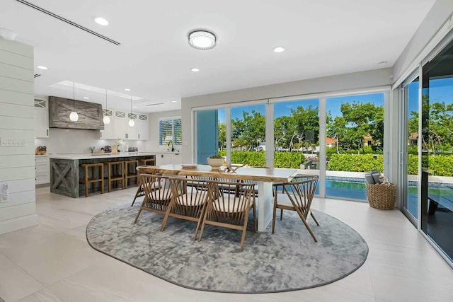 dining room featuring recessed lighting