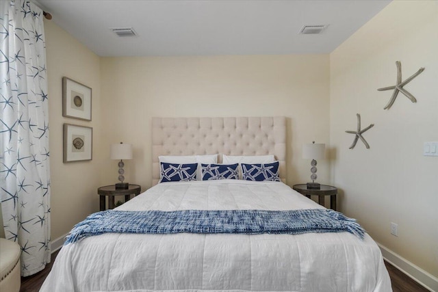 219 Sombrero Beach Rd Unit 2, Marathon, FL 33050 - bedroom featuring dark wood-style floors, baseboards, and visible vents