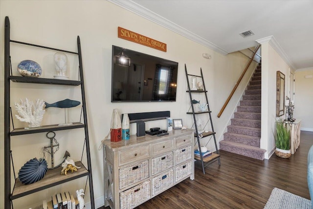 219 Sombrero Beach Rd Unit 2, Marathon, FL 33050 - living room featuring dark wood-style flooring, ornamental molding, visible vents, and stairway