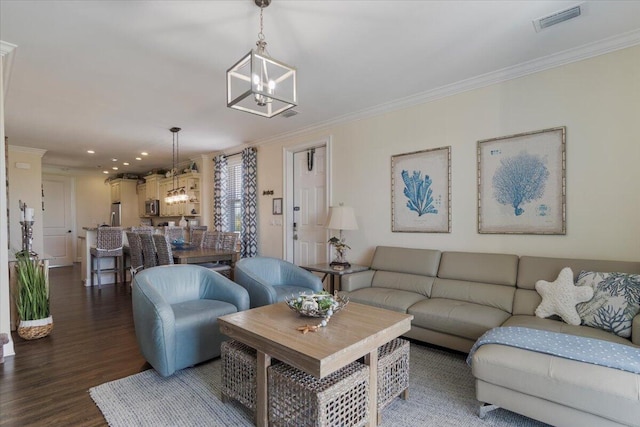 219 Sombrero Beach Rd Unit 2, Marathon, FL 33050 - living room with visible vents, a chandelier, crown molding, and wood finished floors
