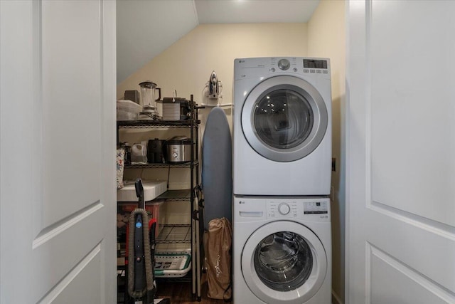 219 Sombrero Beach Rd Unit 2, Marathon, FL 33050 - clothes washing area featuring stacked washing maching and dryer