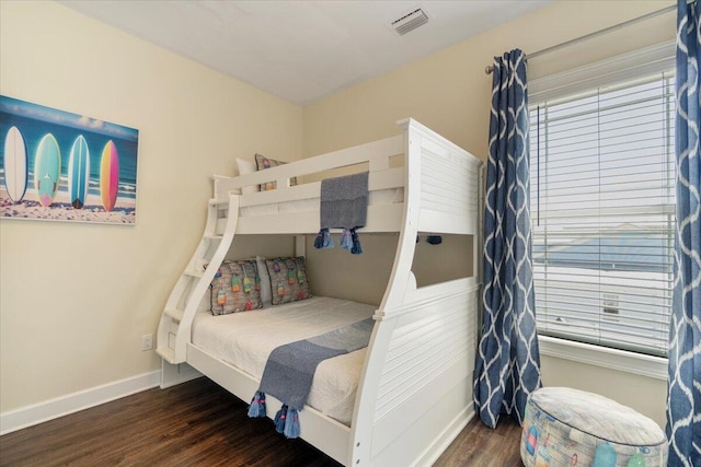 219 Sombrero Beach Rd Unit 2, Marathon, FL 33050 - bedroom featuring baseboards, visible vents, and wood finished floors
