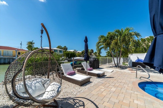 219 Sombrero Beach Rd Unit 2, Marathon, FL 33050 - exterior space with fence and a patio area