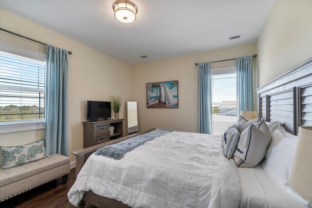 219 Sombrero Beach Rd Unit 2, Marathon, FL 33050 - bedroom featuring wood finished floors and visible vents