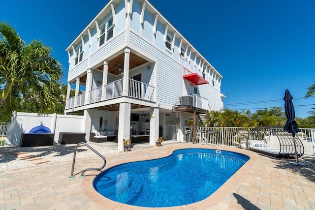 219 Sombrero Beach Rd Unit 2, Marathon, FL 33050 - view of pool with a patio area, fence, outdoor lounge area, and a fenced in pool