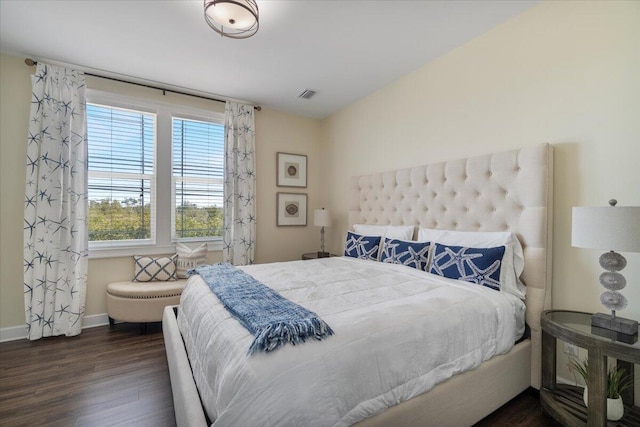 219 Sombrero Beach Rd Unit 2, Marathon, FL 33050 - bedroom with baseboards, visible vents, and wood finished floors