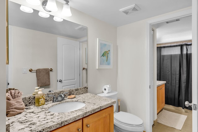 1133 Ocean Dr Unit 4, Marathon, FL 33050 - full bath featuring vanity, toilet, and tile patterned floors