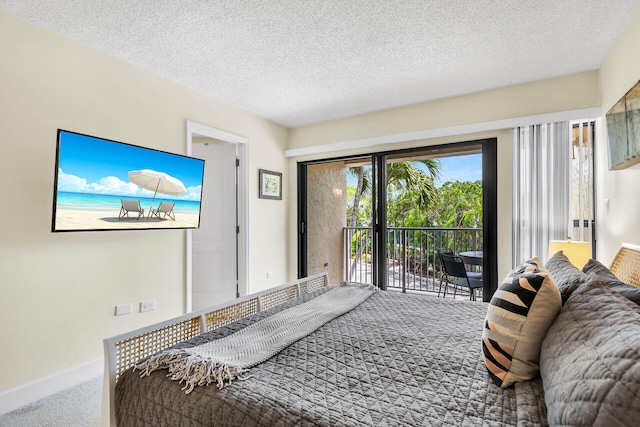 1133 Ocean Dr Unit 4, Marathon, FL 33050 - bedroom featuring carpet floors, access to outside, and a textured ceiling