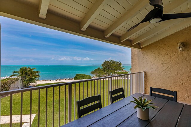 1133 Ocean Dr Unit 4, Marathon, FL 33050 - balcony featuring outdoor dining space, view of water and beach, and ceiling fan