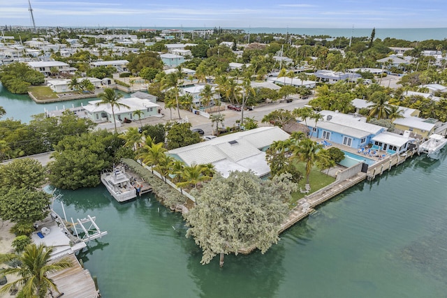 aerial view with a water view and a residential view