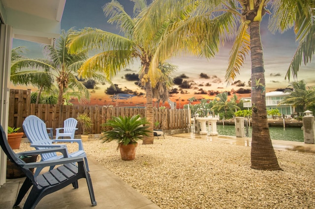 341 3rd St, Key Colony, FL 33051 - view of patio / terrace with fence and a water view