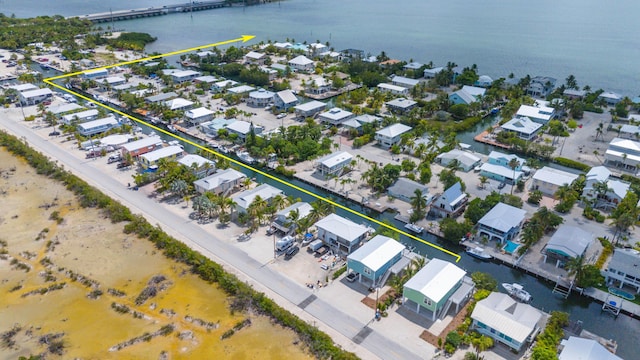 335 Pirates Rd, Little Torch, FL 33042 - aerial perspective of suburban area featuring a large body of water and a notable bridge