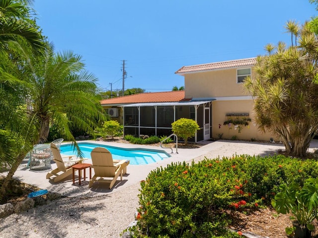30985 Hibiscus Dr, Big Pine, FL 33043 - outdoor pool with a sunroom and a patio area