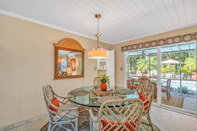 30985 Hibiscus Dr, Big Pine, FL 33043 - dining area featuring speckled floor, a wall unit AC, crown molding, a sunroom, and wooden ceiling