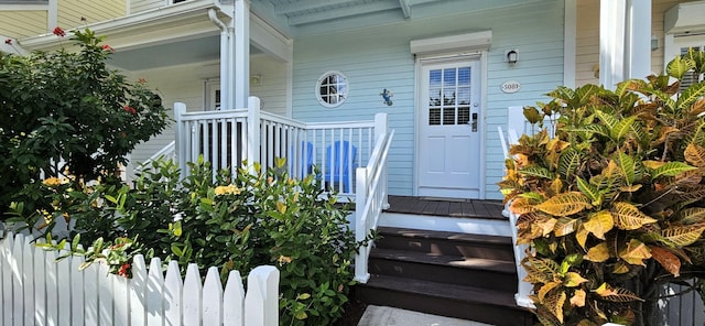 5081 Sunset Village Dr, Duck, FL 33050 - entrance to property featuring a porch and fence