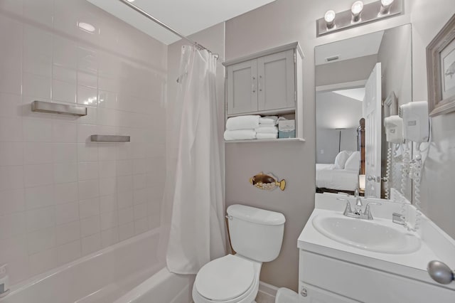 5081 Sunset Village Dr, Duck, FL 33050 - full bathroom with ensuite bathroom, vanity, toilet, and shower / tub combo with curtain