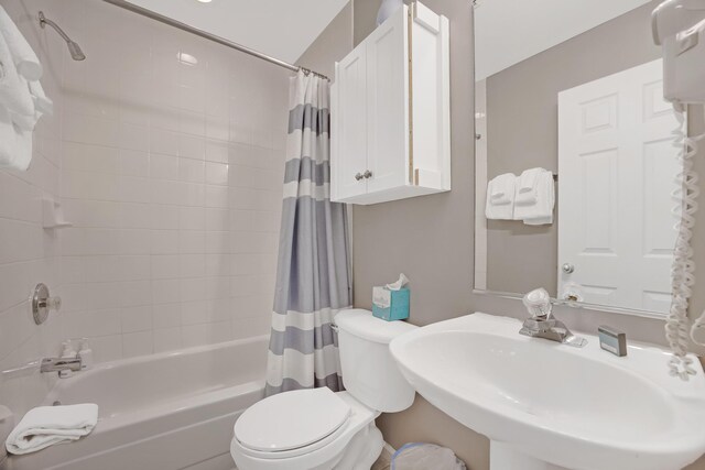 5081 Sunset Village Dr, Duck, FL 33050 - full bathroom featuring shower / bath combo, a sink, and toilet