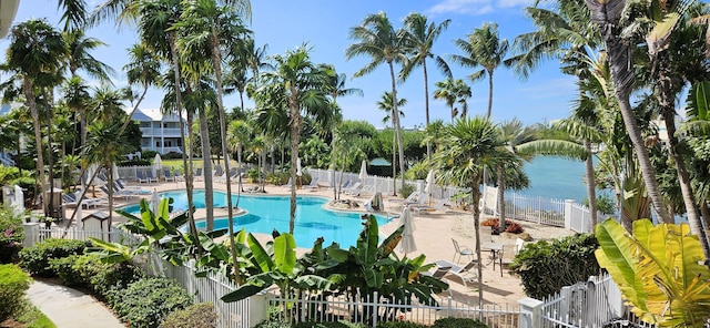 5081 Sunset Village Dr, Duck, FL 33050 - community pool featuring fence, a patio, and a water view