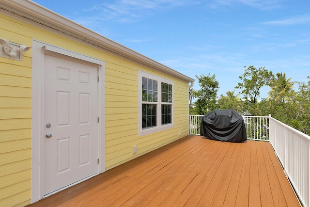 437 Pirates Rd, Little Torch, FL 33042 - wooden deck with a grill