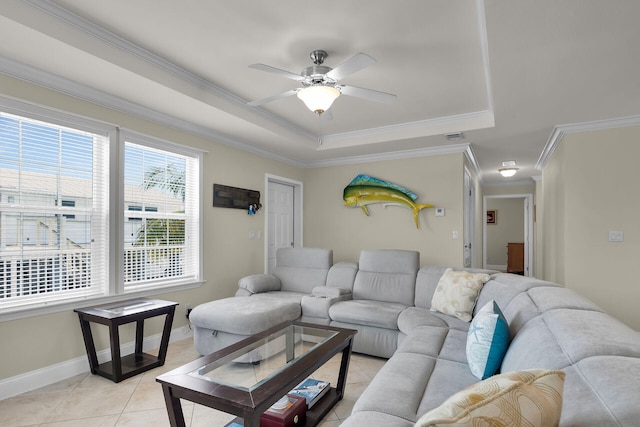 437 Pirates Rd, Little Torch, FL 33042 - living area featuring a tray ceiling, light tile patterned floors, ornamental molding, a ceiling fan, and baseboards