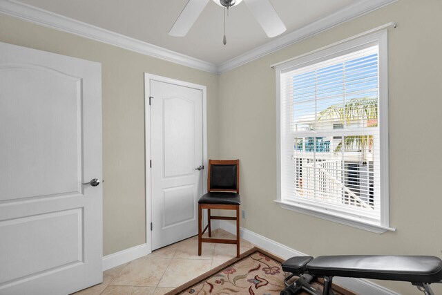 437 Pirates Rd, Little Torch, FL 33042 - living area featuring healthy amount of natural light, ornamental molding, baseboards, a ceiling fan, and light tile patterned floors